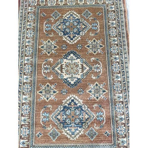 792 - An Nourison Maymana Turkish rug with classical Persian and tribal motifs - approx. 175cm x 114cm