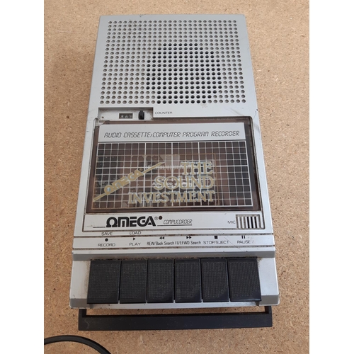 1061 - A box containing Sinclair ZX Spectrum, ZX power supply, Spectravideo™ joystick, Datel Electronics jo... 