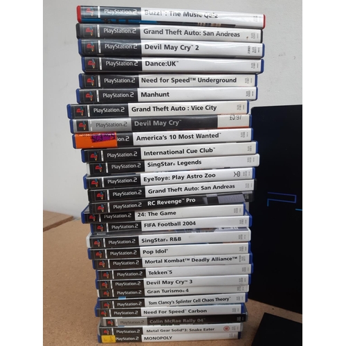 1072 - A box containing three Sony PlayStation 2 consoles, two original and one slimline with black and sil... 