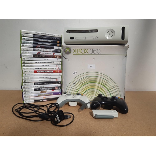 1073 - A boxed Xbox 360 console with leads, three controllers and a large selection of games to include Bat... 