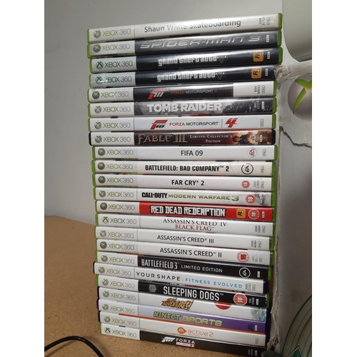 1073 - A boxed Xbox 360 console with leads, three controllers and a large selection of games to include Bat... 