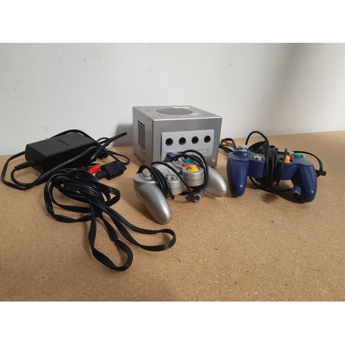 1074 - A Nintendo Game Cube console with leads, two controllers and memory card