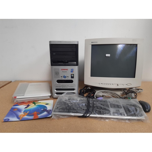 1075 - A box containing Compaq Presario PC, HP 14