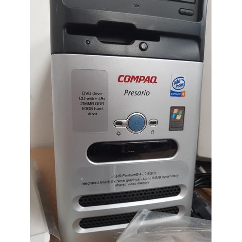 1075 - A box containing Compaq Presario PC, HP 14