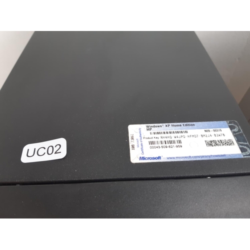 1075 - A box containing Compaq Presario PC, HP 14