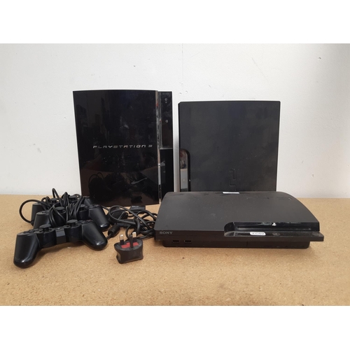 1077 - A box containing three Sony PlayStation 3 consoles, one original and two slimline with one power lea... 