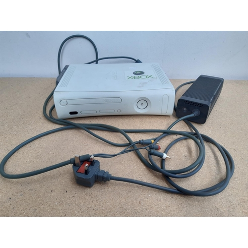 1078 - An Xbox 360 games console with lead and power supply