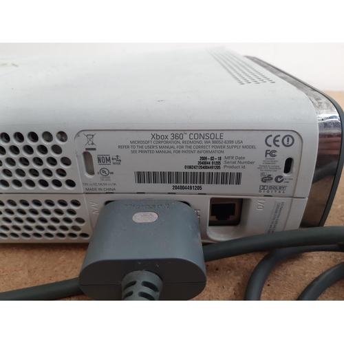 1078 - An Xbox 360 games console with lead and power supply