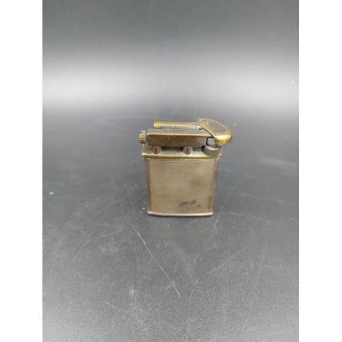 250 - Two items, one stamped sterling silver P.P.LD engine turned cigarette lighter and one 12cm hallmarke... 