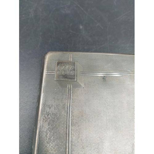 251 - An Art Deco hallmarked London silver engine turned cigarette case by Padgett & Braham LTD, dated 193... 