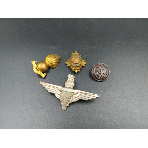 327 - A collection of military buttons, cap badges and patches to include four ATS (Auxiliary Territorial ... 