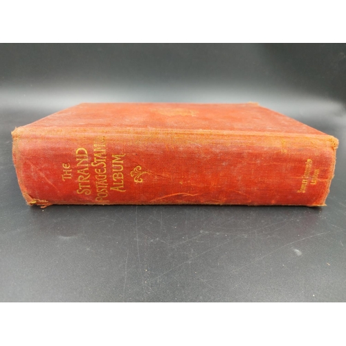 328 - A mid 20th century Stanley Gibbons Strand stamp album containing a large collection of worldwide sta... 