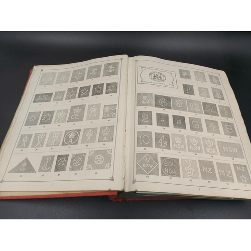 328 - A mid 20th century Stanley Gibbons Strand stamp album containing a large collection of worldwide sta... 