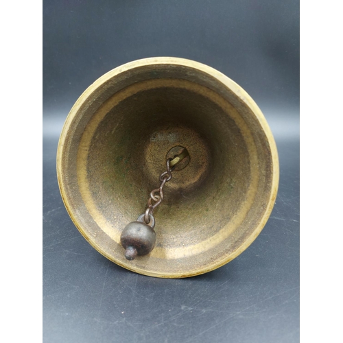 342 - A mid 20th century Scope brass and oak handled charity bell with inscription - approx. 23cm high