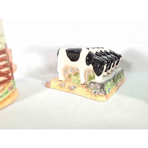 414 - Three pieces of Border Fine Arts James Herriot's Country Kitchen china to include cheese dish, pig p... 