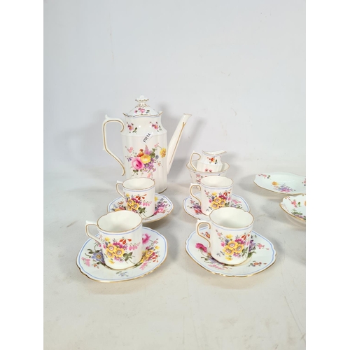 424 - Twenty three pieces of Royal Crown Derby 'Derby Posies' china comprising four coffee cups, four sauc... 