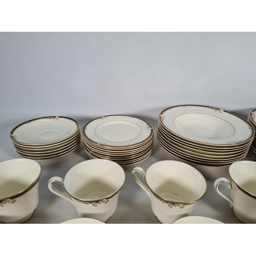 429 - A fifty two piece Minton 'Newbury' tea/dinner set comprising five teacups, seven saucers, ten soup b... 