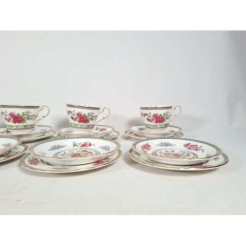 431A - An eighteen piece Paragon 'Tree of Kashmir' tea set comprising three teacups, six saucers, six side ... 