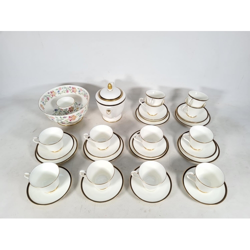 432 - A thirty one piece Minton 'Saturn' tea set comprising twelve teacups, twelve saucers, six side plate... 