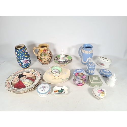 433 - A collection of various ceramics to include three Wedgwood pale blue Jasperware trinket boxes, one W... 