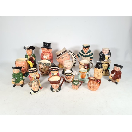 434 - A collection of various character and Toby jugs to include Royal Doulton 'The Celebrity Collection',... 