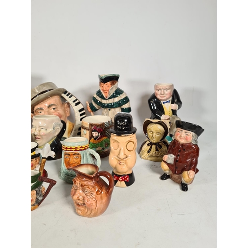 434 - A collection of various character and Toby jugs to include Royal Doulton 'The Celebrity Collection',... 