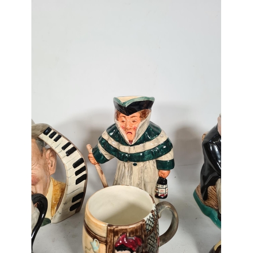 434 - A collection of various character and Toby jugs to include Royal Doulton 'The Celebrity Collection',... 