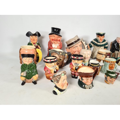 434 - A collection of various character and Toby jugs to include Royal Doulton 'The Celebrity Collection',... 