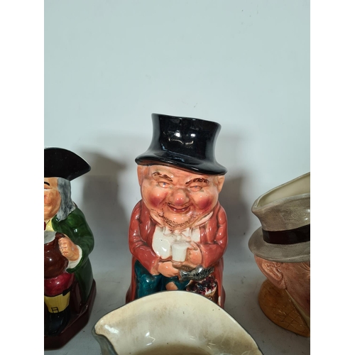 434 - A collection of various character and Toby jugs to include Royal Doulton 'The Celebrity Collection',... 