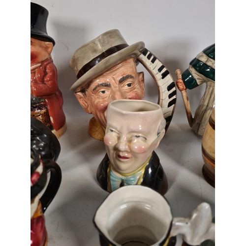 434 - A collection of various character and Toby jugs to include Royal Doulton 'The Celebrity Collection',... 