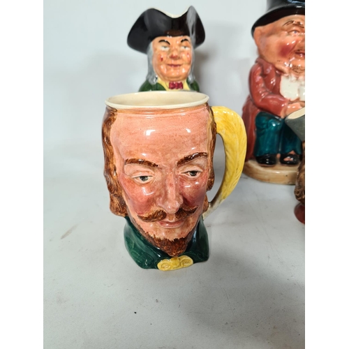 434 - A collection of various character and Toby jugs to include Royal Doulton 'The Celebrity Collection',... 