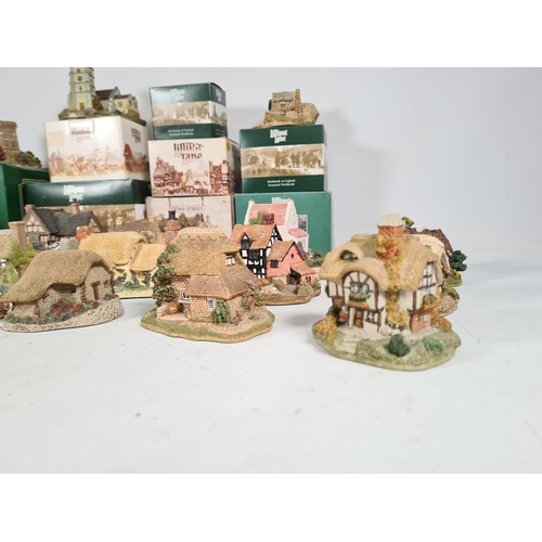 440 - A large collection of 'Lilliput Lane' cottages to include Watermill, Wheyside, Bramble cottage, Brit... 