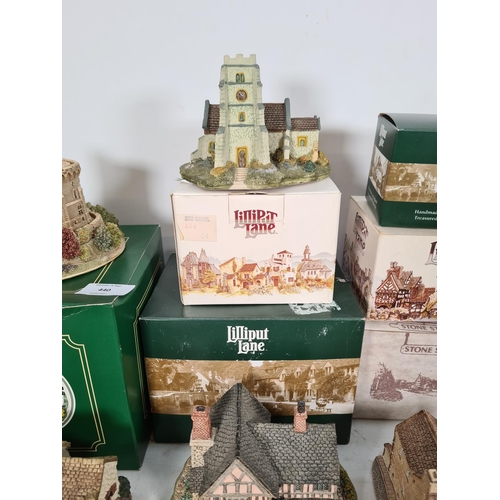 440 - A large collection of 'Lilliput Lane' cottages to include Watermill, Wheyside, Bramble cottage, Brit... 