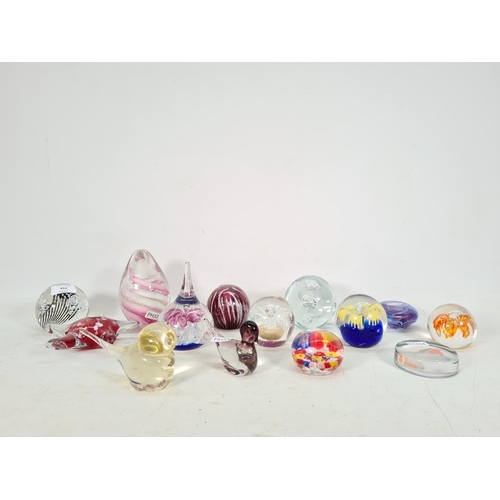 452 - Fourteen various art glass paperweights to include Murano duck, Murano style millefiori, Mdina limit... 