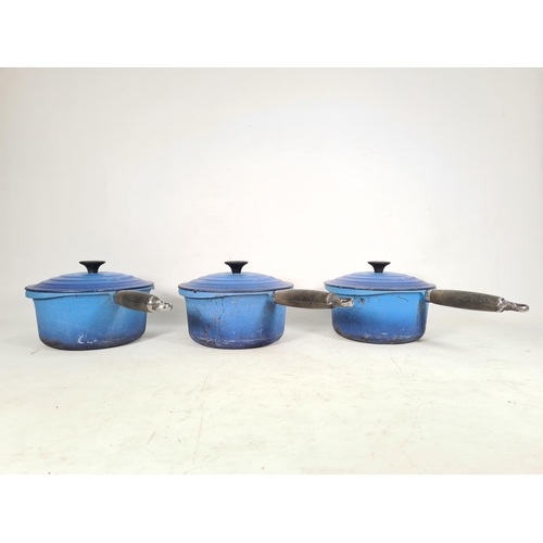 471 - Three Le Creuset blue enamel cast iron saucepans