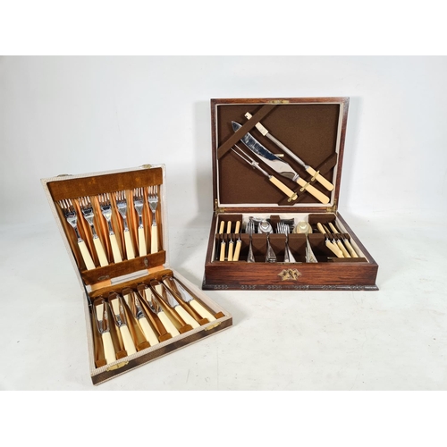 473 - A vintage oak cased fifty three piece canteen of cutlery and a vintage leather cased twelve piece fi... 