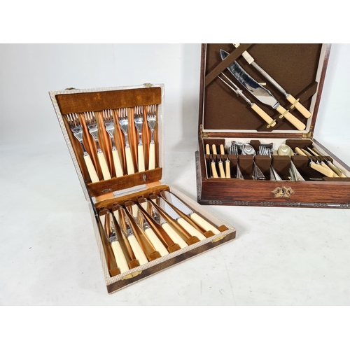 473 - A vintage oak cased fifty three piece canteen of cutlery and a vintage leather cased twelve piece fi... 