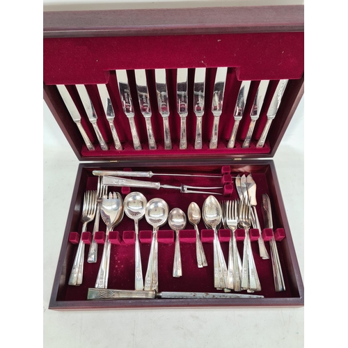 476 - A collection of various metalware to include a Priestley & Moore Ltd. mahogany cased sixty one piece... 