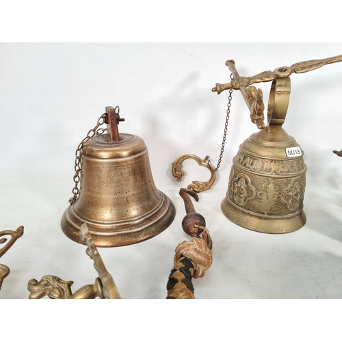 490 - Four vintage brass bells and one brass bracket