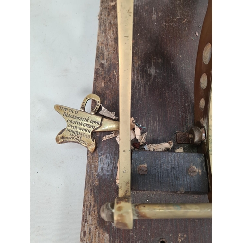 491 - A vintage brass ornamental cannon on wooden plinth - approx. 23cm high x 15cm wide x 45cm deep