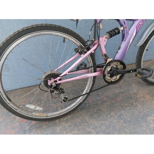 1197 - A purple and pink Barcelona Stealth lady's dual suspension mountain bike with 18 speed Falcon gear s... 