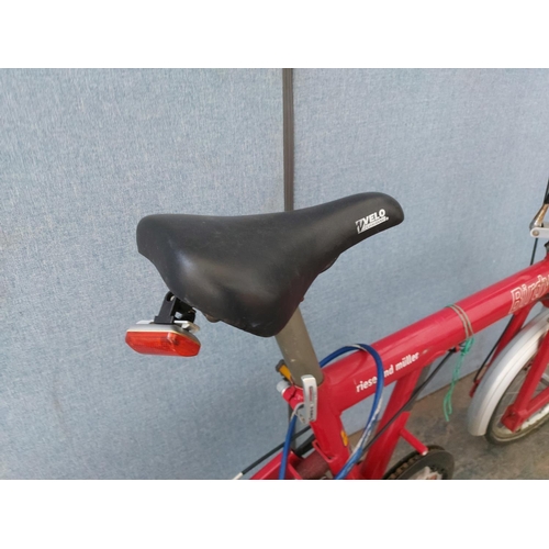 1200 - A red Riese and Muller Birdie folding bicycle with quick release wheels, Tektro brakes, rear carrier... 