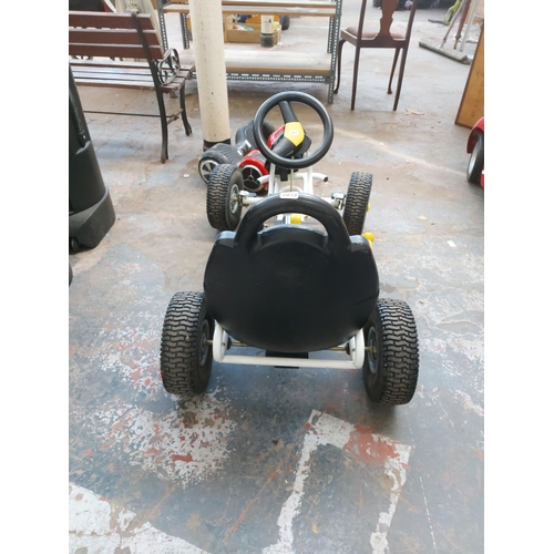 1205 - A black and white Kettcar Hurricane pedal go-kart