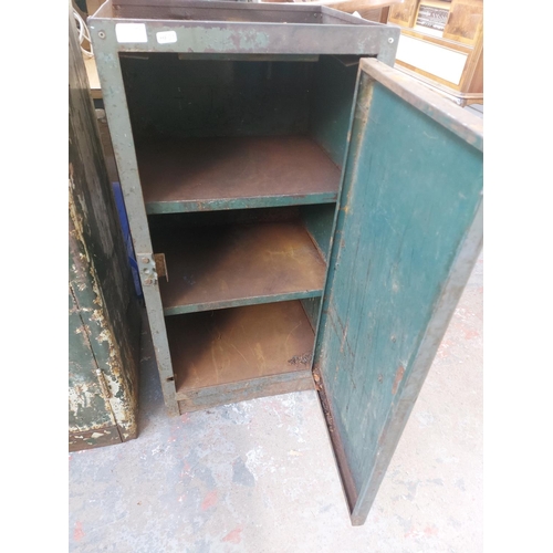 1213 - Two vintage metal workshop cabinets, one Milners with two doors and internal shelving - approx. 6' x... 