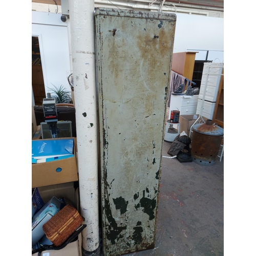 1213 - Two vintage metal workshop cabinets, one Milners with two doors and internal shelving - approx. 6' x... 