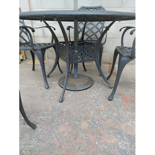 1230 - A six piece cast aluminium patio set comprising circular pedestal table - approx. 1.2 metres in diam... 