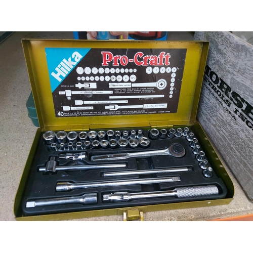 1234 - Two complete metal cased socket sets, one Hilka forty piece ¼