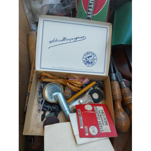 1245A - Two boxes containing two vintage leather and brass Chesterman tape measures, wooden handled screwdri... 