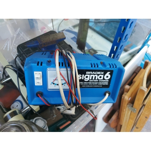 1252 - A box containing Bradex Sigma 6 6/12V battery charger, Marples 6552 ½ and ¾ tap spanner, Record mini... 