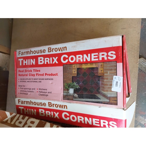 1256 - Ten boxes of Wickes Thin Brix farmhouse red and farmhouse brown facing bricks